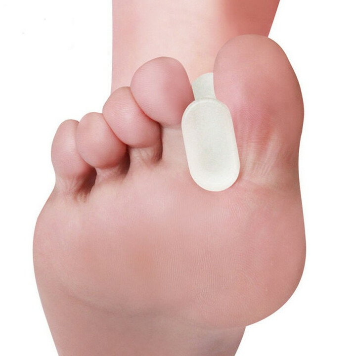 Silikoninen varpaanerottaja kauluksilla