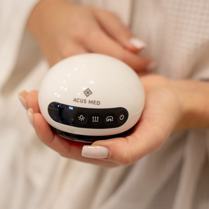 Sähköinen hierontalaite selluliittia vastaan punavaloterapialla